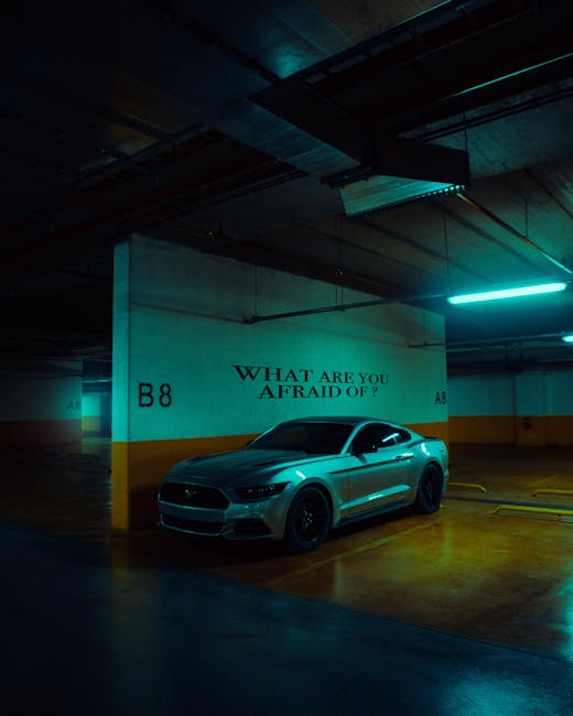 Luxury Cars - A Ford Mustang parked in a dimly lit garage with #13693478