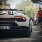 Luxury Cars - A sleek sports car with a visible tail light on #13971785