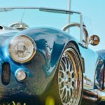Luxury Cars - Close-up of a vintage blue convertible car with #14038353