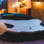 Luxury Cars - White sports car with sleek design parked in an #14196938