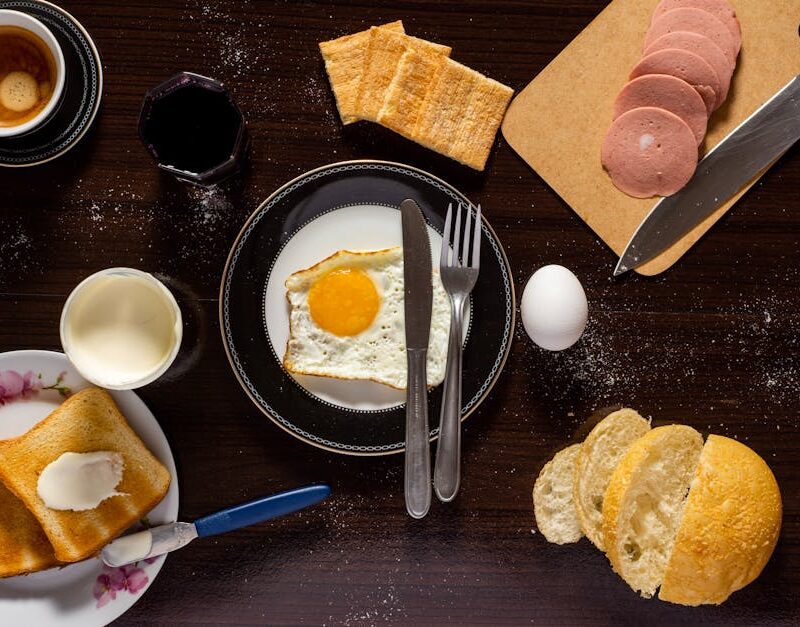 Food Aesthetics - A top view of a breakfast spread with eggs, toas #1448722