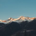 Mountain Landscapes - Beautiful sunset over snow capped Dolomites in T #15021365