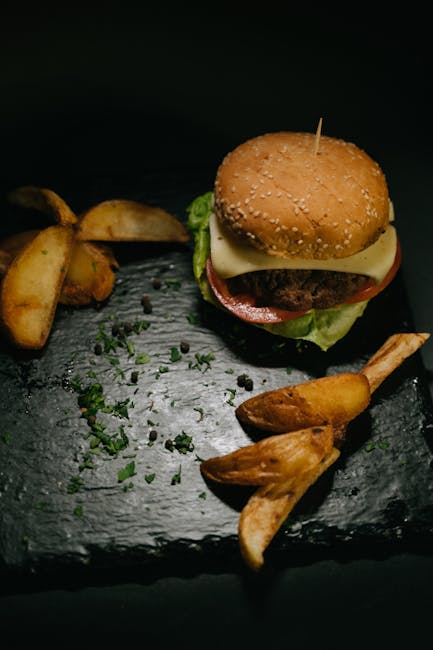 Food Aesthetics - Close-up of a delectable cheeseburger with crisp #16148034