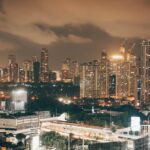 City Architecture - Illuminated cityscape at dusk showcasing modern #18048284