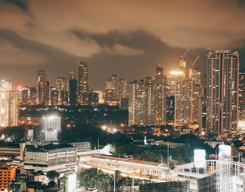 City Architecture - Illuminated cityscape at dusk showcasing modern #18048284