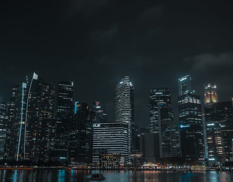 City Architecture - Dramatic view of Singapore's illuminated citysca #18095381