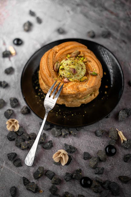 Food Aesthetics - A beautifully presented pistachio cake topped wi #31846711