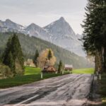 Mountain Landscapes - Scenic mountain road through lush landscapes and #34123174
