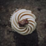 Food Aesthetics - Top view of a gourmet cupcake with cream frostin #34746654