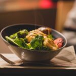 Food Aesthetics - Delicious bowl of salad with fresh greens and gr #842545