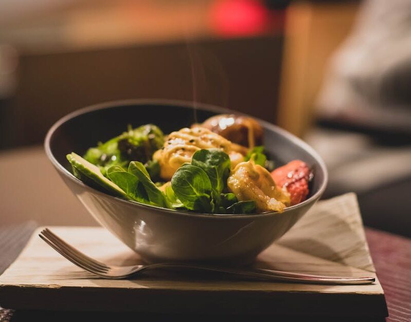 Food Aesthetics - Delicious bowl of salad with fresh greens and gr #842545