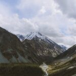 Mountain Landscapes - A stunning aerial view of a tranquil valley with #8761447